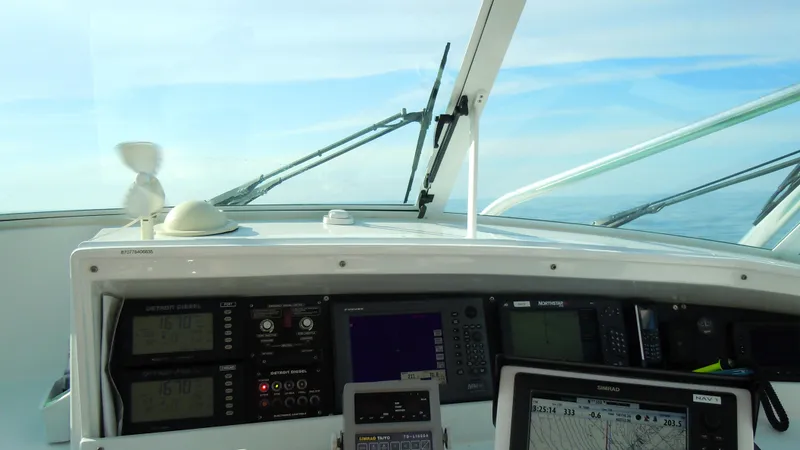 Slide: The Image of Dashboard of a 2001 Davis 45 Express boat with navigation equipment. - 6