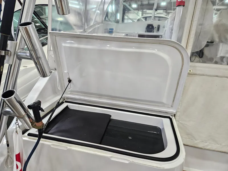 Slide: The Image of Open storage compartment on a 2001 Davis 45 Express boat. - 9