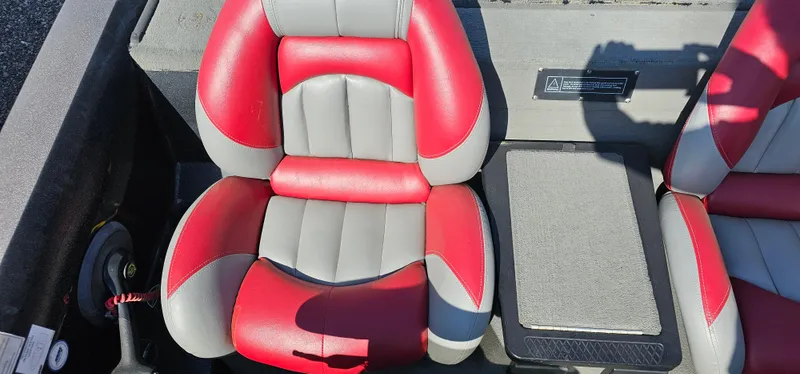 Slide: The Image of Red and gray seat in a 2009 Stratos 201 XL boat interior. - 20