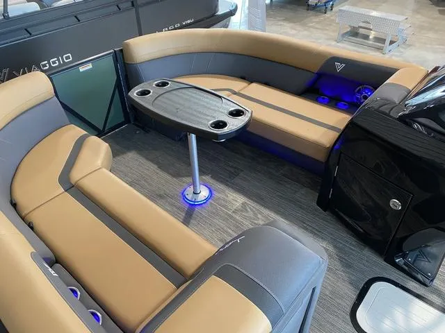 Slide: The Image of Luxurious interior of 2025 Viaggio X22S boat with stylish seating and table. - 11