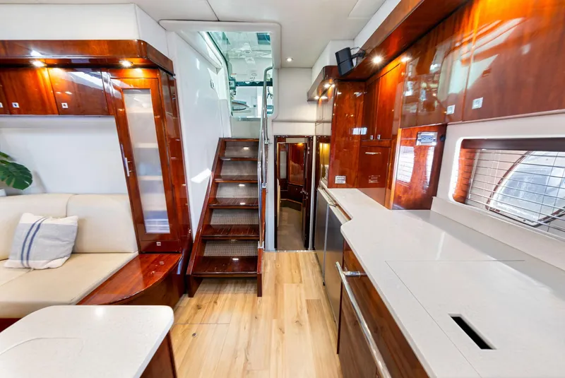 Slide: The Image of Luxurious interior of 2009 Sea Ray 55 Sundancer yacht with elegant wood finishes. - 10