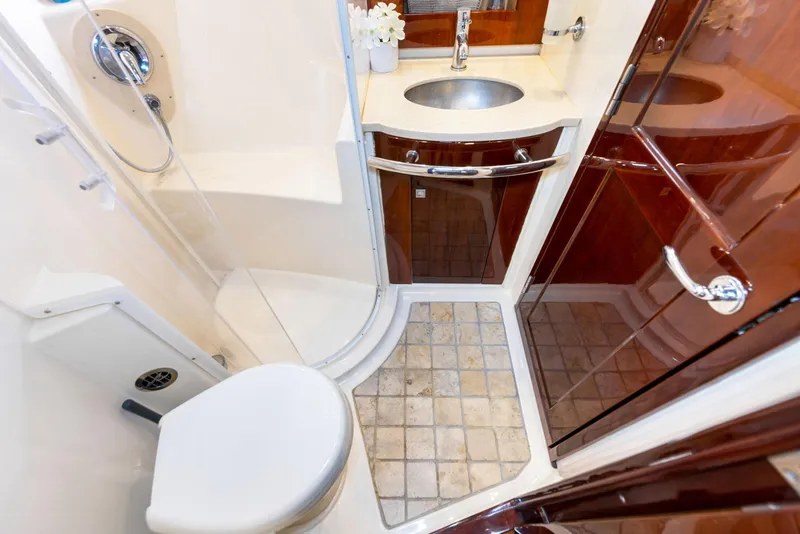 Slide: The Image of Luxurious bathroom in 2009 Sea Ray 55 Sundancer yacht with shower and sink. - 15