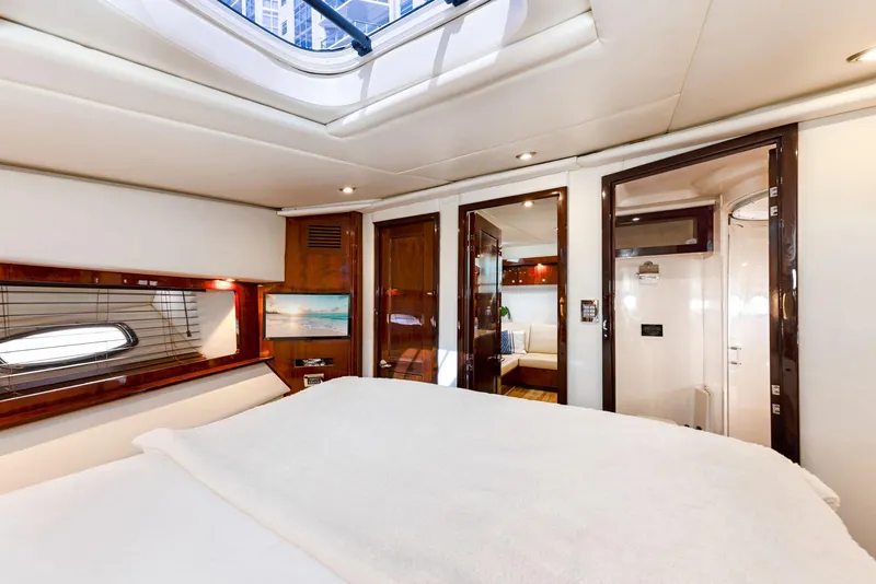 Slide: The Image of Luxurious interior of 2009 Sea Ray 55 Sundancer yacht with elegant wood finishes. - 17