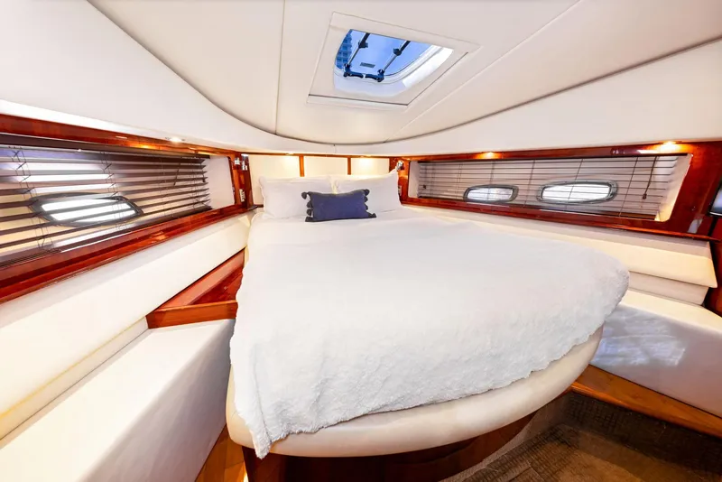 Slide: The Image of Luxurious bedroom interior of 2009 Sea Ray 55 Sundancer yacht. - 18