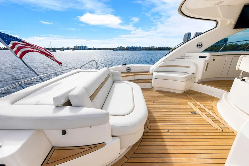 Slide: The Image of Luxurious 2009 Sea Ray 55 Sundancer yacht with spacious deck and elegant seating. - 20