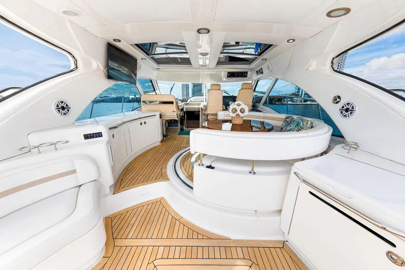 Slide: The Image of Luxurious 2009 Sea Ray 55 Sundancer yacht interior with elegant seating and modern amenities. - 23