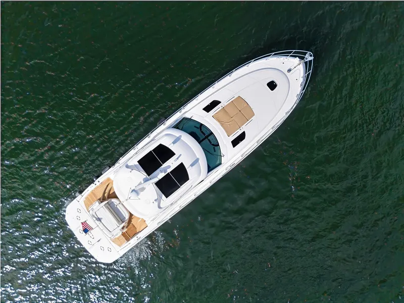 Slide: The Image of Aerial view of 2009 Sea Ray 55 Sundancer yacht on open water. - 6