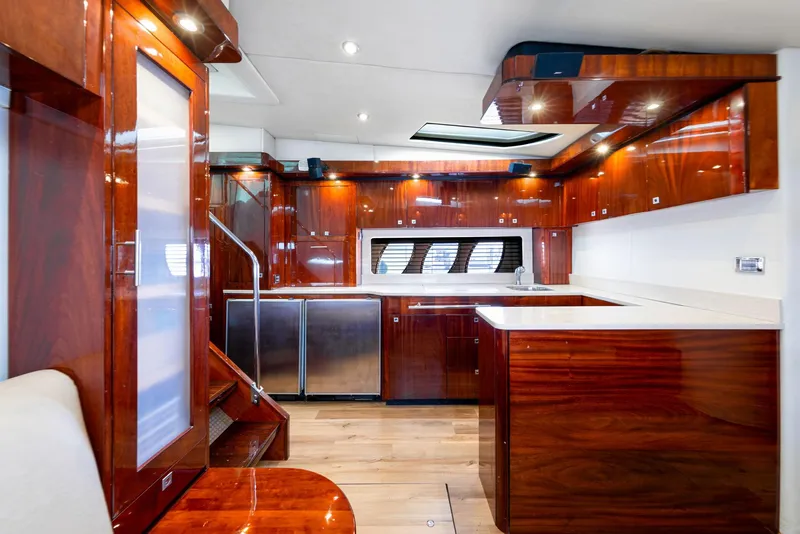 Slide: The Image of Luxurious interior of 2009 Sea Ray 55 Sundancer yacht with polished wood finishes. - 7