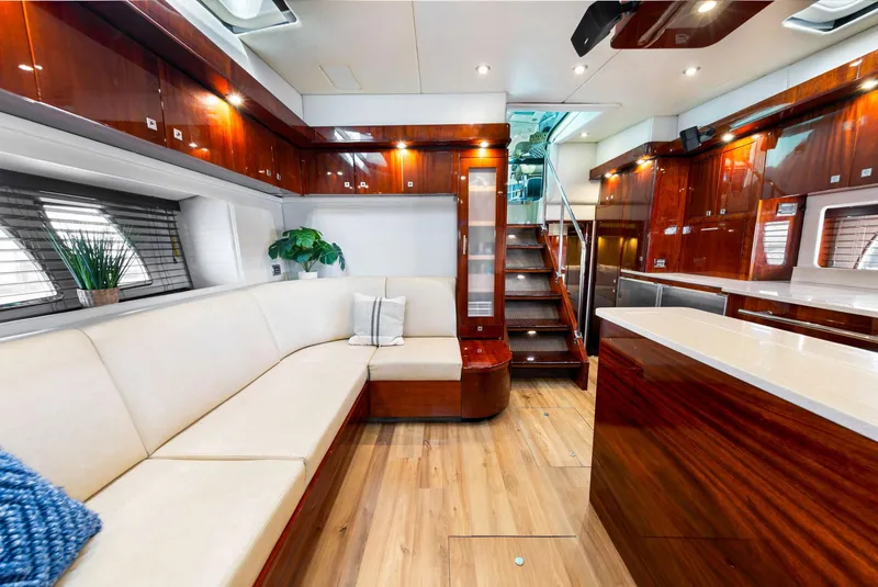 Slide: The Image of Luxurious interior of 2009 Sea Ray 55 Sundancer yacht with elegant wood finishes. - 9