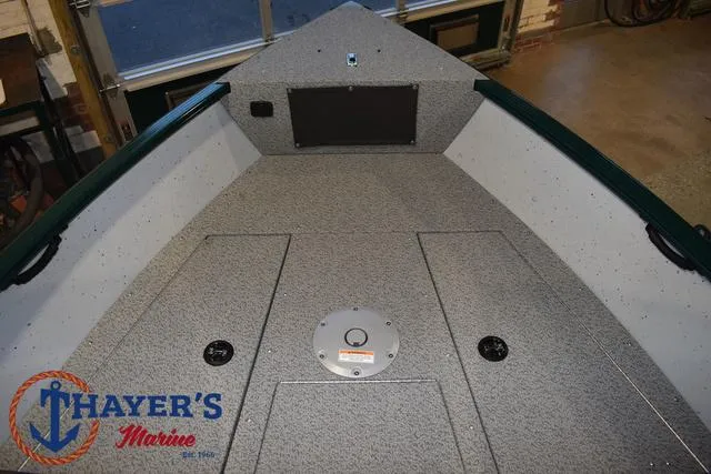 Slide: The Image of 2025 Lund 1675 Adventure Sport boat interior at Thayer's Marine showroom. - 11