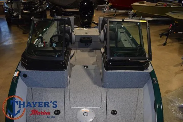 Slide: The Image of 2025 Lund 1675 Adventure Sport boat interior at Thayer's Marine showroom. - 14
