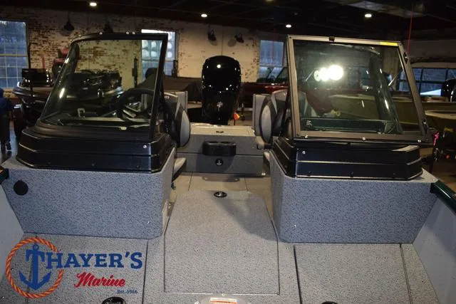 Slide: The Image of 2025 Lund 1675 Adventure Sport boat interior at Thayer's Marine showroom. - 15