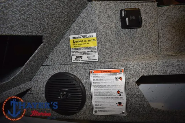 Slide: The Image of 2025 Lund 1675 Adventure Sport interior with capacity and safety labels. - 26