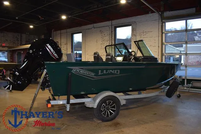 Slide: The Image of 2025 Lund 1675 Adventure Sport boat on trailer in showroom. - 3