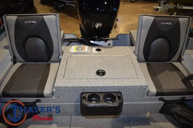 Slide: The Image of 2025 Lund 1675 Adventure Sport boat interior with seating and storage. - 31