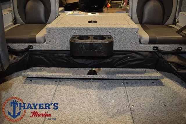 Slide: The Image of 2025 Lund 1675 Adventure Sport boat interior with seating and storage. - 39