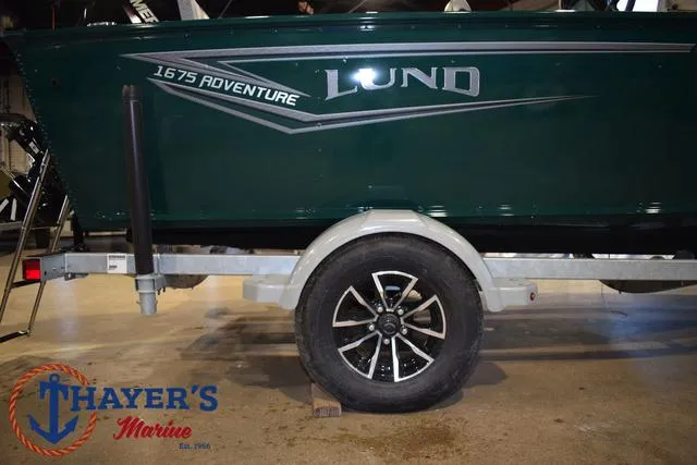 Slide: The Image of 2025 Lund 1675 Adventure Sport boat on trailer at Thayer's Marine. - 5