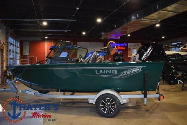 Slide: The Image of 2025 Lund 1675 Adventure Sport boat on trailer in showroom. - 7