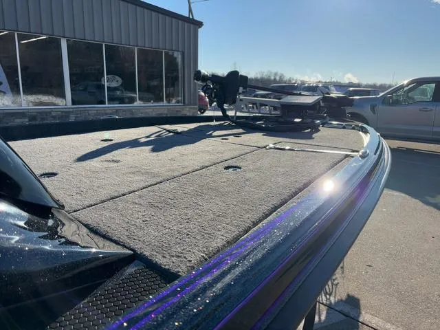 Slide: The Image of 2025 Phoenix 721zxl boat deck in sunlight, parked outside a building. - 6