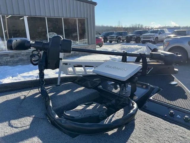Slide: The Image of Phoenix 721zxl 2025 boat with Garmin equipment, parked outside in snowy weather. - 9