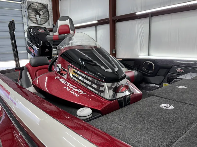 Slide: The Image of 2018 Ranger Z518c boat with Mercury engine in a garage setting. - 13