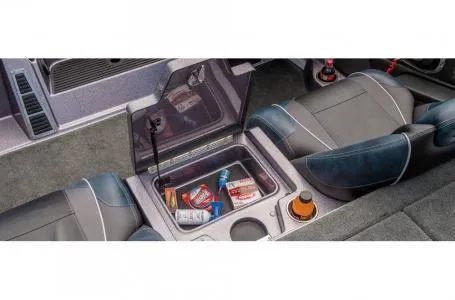 Slide: The Image of 2018 Ranger Z518c interior with open storage compartment, containing snacks and drinks. - 30