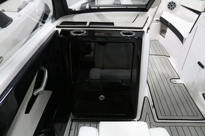 Slide: The Image of Interior of 2025 Yamaha Boats 222S, featuring sleek design and modern amenities. - 12