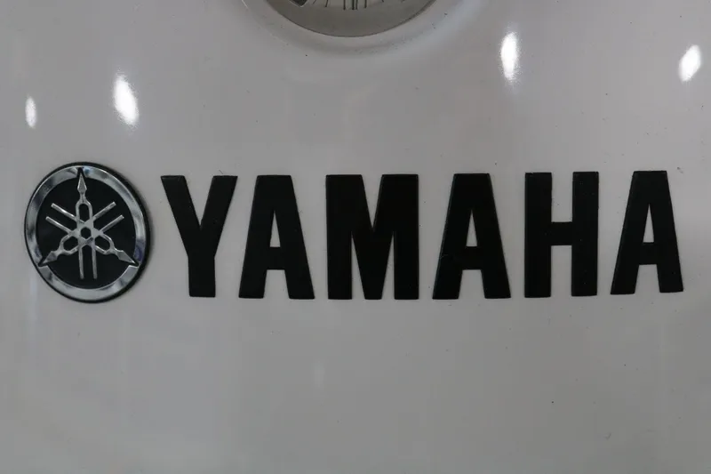 Slide: The Image of Yamaha logo on 2025 Yamaha Boats 222S model. - 24