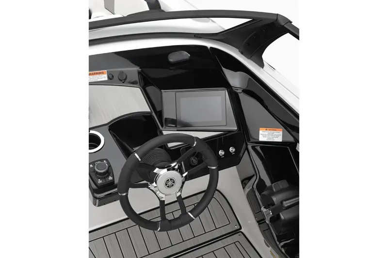 Slide: The Image of 2025 Yamaha Boats 222S dashboard with steering wheel and touchscreen display. - 32