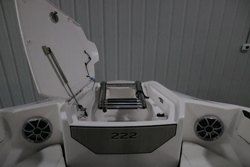 Slide: The Image of 2025 Yamaha Boats 222S, open storage compartment, sleek design, modern features. - 5