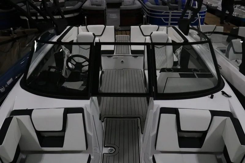 Slide: The Image of 2025 Yamaha Boats 222S interior with sleek seating and modern design. - 7