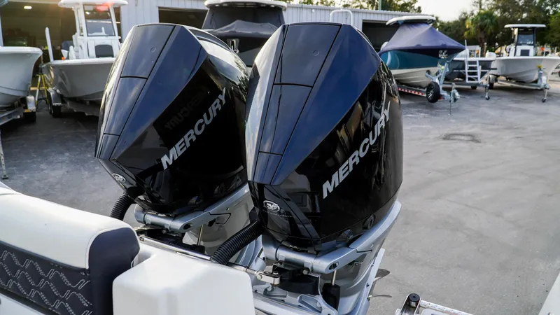 Slide: The Image of Twin Mercury outboard engines on 2023 Tidewater 320 CC Adventure boat. - 10