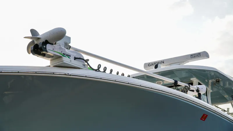 Slide: The Image of 2023 Tidewater 320 CC Adventure boat with Garmin radar and trolling motor. - 11