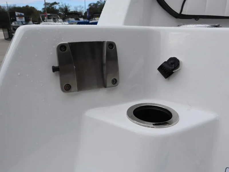 Slide: The Image of 2025 Yamaha Boats 222 FSH Sport E, close-up of deck fittings and cup holder. - 10