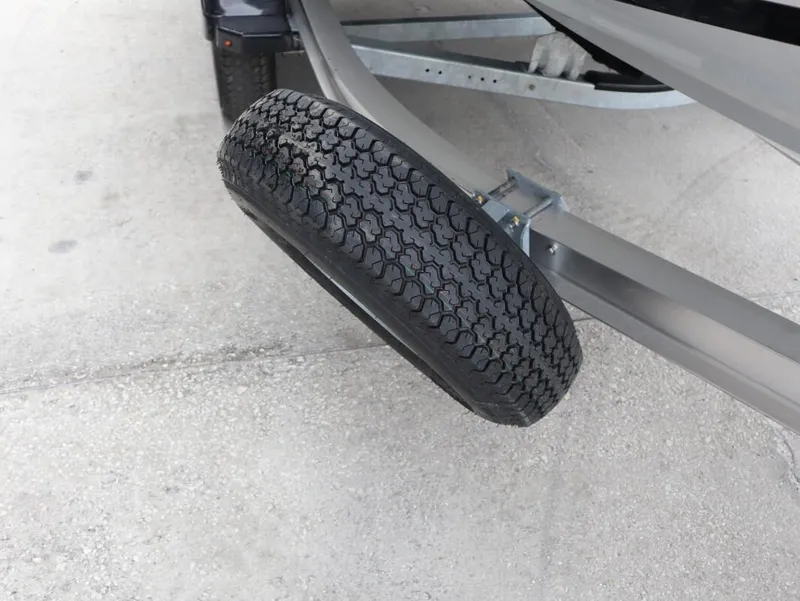 Slide: The Image of Spare tire mounted on a trailer for a 2025 Yamaha Boats 222 FSH Sport E. - 12