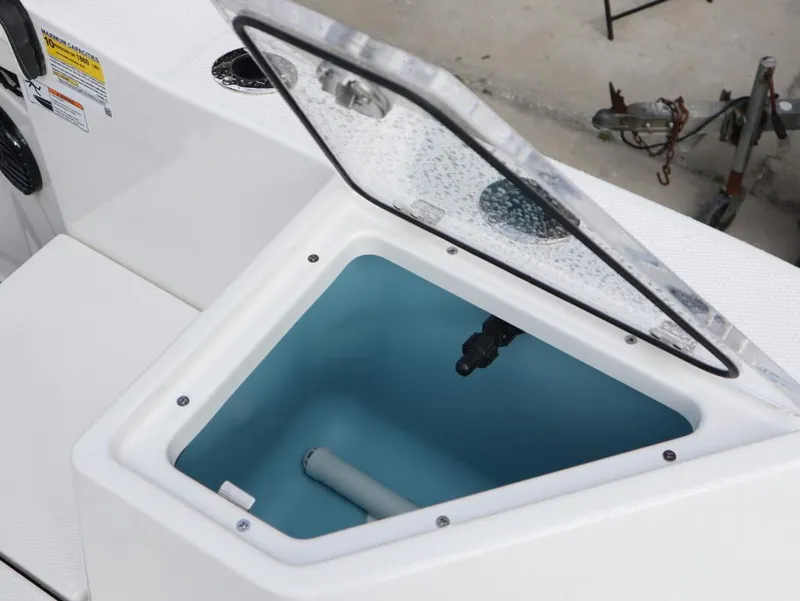 Slide: The Image of Open storage compartment on 2025 Yamaha Boats 222 FSH Sport E. - 20