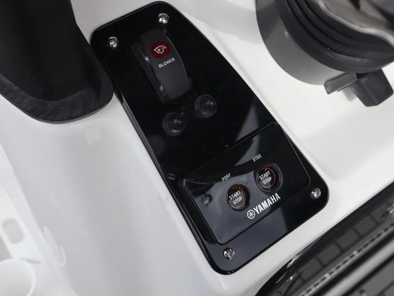 Slide: The Image of Control panel of 2025 Yamaha Boats 222 FSH Sport E, featuring start/stop buttons. - 22