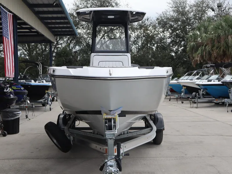 Slide: The Image of 2025 Yamaha Boats 222 FSH Sport E on trailer, displayed outdoors. - 7