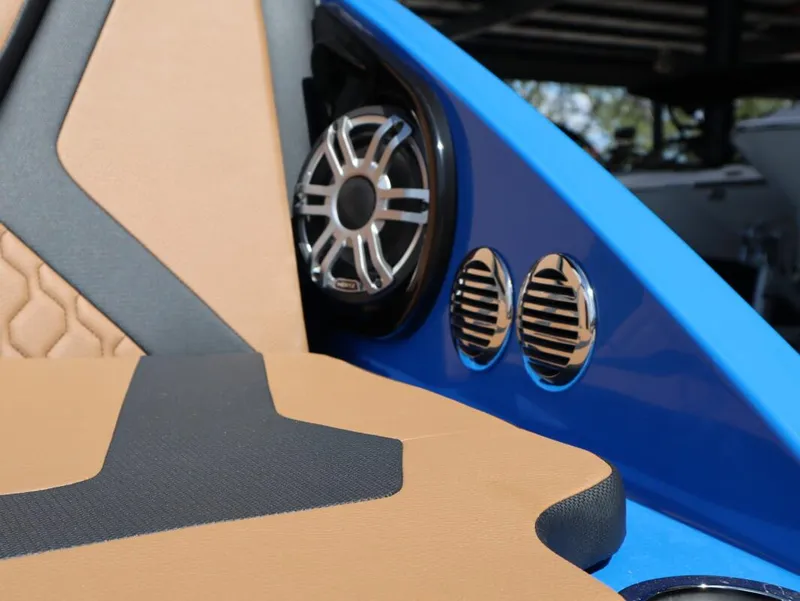 Slide: The Image of 2025 Yamaha Boats 222XD interior with premium speakers and stylish seating. - 13