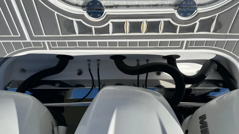 Slide: The Image of 2021 Blackwater 36 SF boat engine compartment with detailed wiring and tubing. - 12