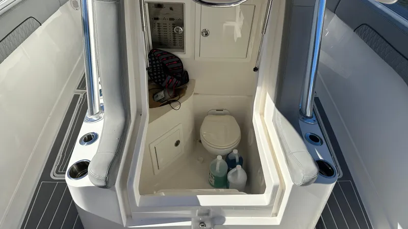 Slide: The Image of 2021 Blackwater 36 SF boat interior with toilet and storage area. - 15