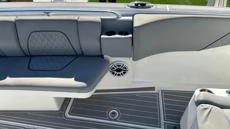 Slide: The Image of 2021 Blackwater 36 SF boat interior with gray seating and flooring. - 17