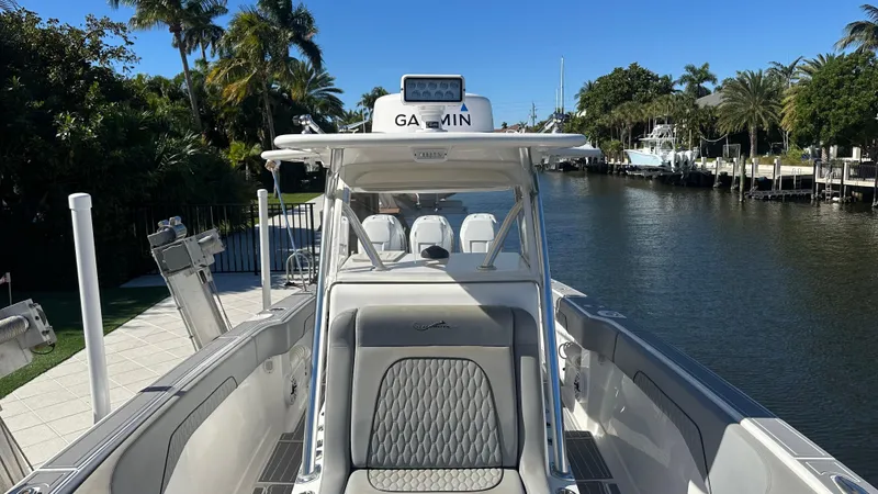 Slide: The Image of 2021 Blackwater 36 SF boat with Garmin equipment on a sunny canal. - 18
