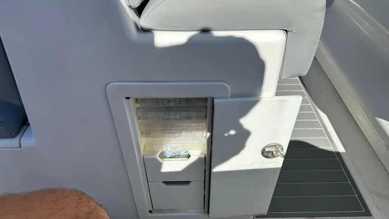 Slide: The Image of Open storage compartment on 2021 Blackwater 36 SF boat interior. - 8