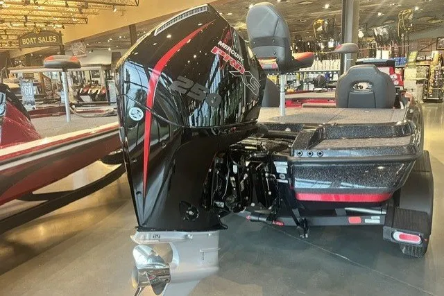 Slide: The Image of 2025 Nitro Z20 XL Pro boat with powerful Mercury engine on display in showroom. - 124