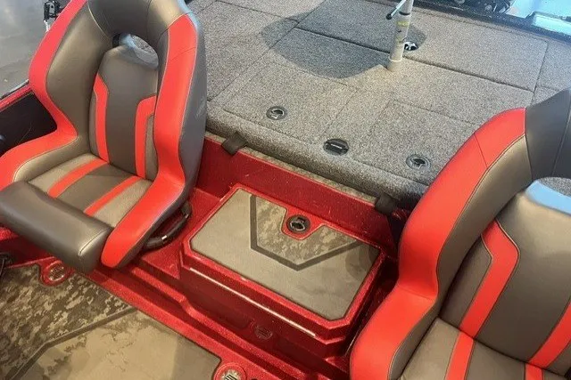 Slide: The Image of 2025 Nitro Z20 XL Pro boat interior with red and gray seating and storage compartments. - 127