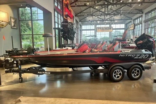 Slide: The Image of 2025 Nitro Z20 XL Pro bass boat displayed in a showroom with modern interior. - 121