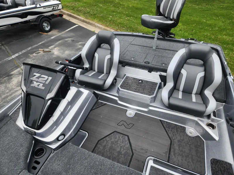 Slide: The Image of 2025 Nitro Z21 XL boat interior with dual seats and sleek design. - 3