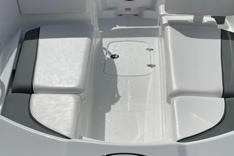 Slide: The Image of Interior seating of 2025 Tahoe T16 boat with white and black cushions. - 4