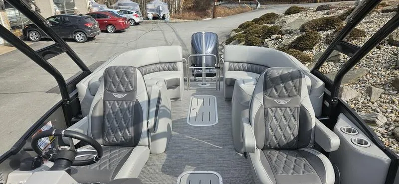 Slide: The Image of 2024 Bennington R 24 RTFBA pontoon boat with luxurious seating and modern design. - 5